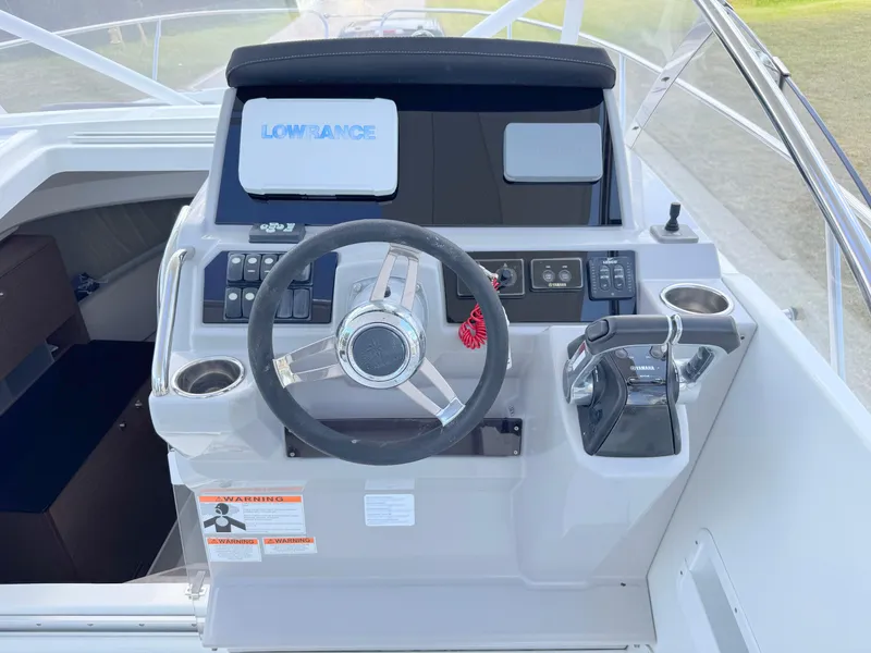 Slide: The Image of Cockpit of 2018 Jeanneau Leader 9.0 WA with steering wheel and control panel. - 20