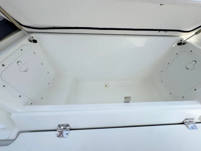 Slide: The Image of Open storage compartment on 2018 Jeanneau Leader 9.0 WA boat. - 32