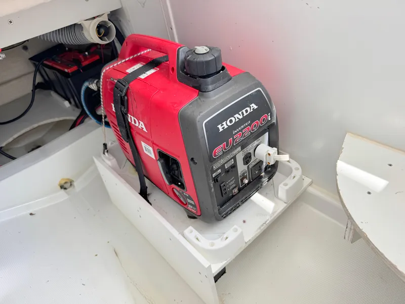 Slide: The Image of Portable Honda EU2200i generator on a 2018 Jeanneau Leader 9.0 WA boat. - 35