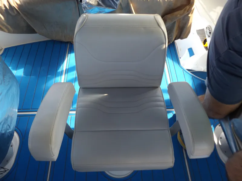 Slide: The Image of Captain's chair on 2003 Carver 360 Sport Sedan with blue deck background. - 22