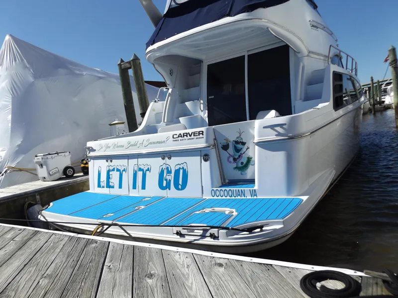 Slide: The Image of 2003 Carver 360 Sport Sedan docked, featuring "Let It Go" on the stern, Occoquan, VA. - 39