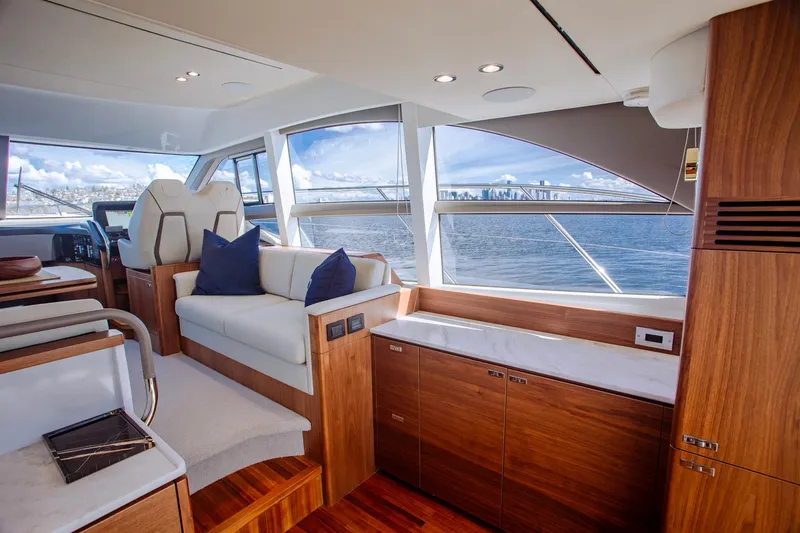 Slide: The Image of Luxurious interior of 2022 Princess F50 yacht with elegant wood finishes and waterfront view. - 25