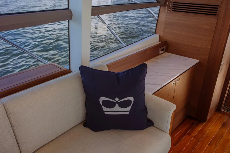 Slide: The Image of Luxurious interior of 2022 Princess F50 yacht with elegant seating and scenic water view. - 29