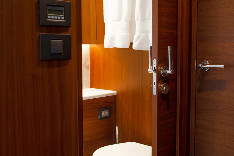 Slide: The Image of Luxurious wooden interior of 2022 Princess F50 yacht bathroom with modern fixtures. - 41