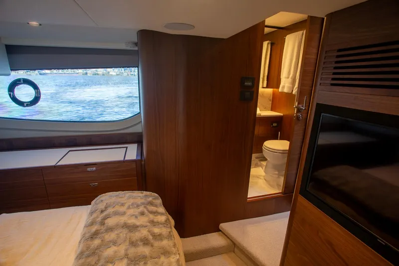 Slide: The Image of Luxurious interior of 2022 Princess F50 yacht with bedroom and bathroom view. - 42