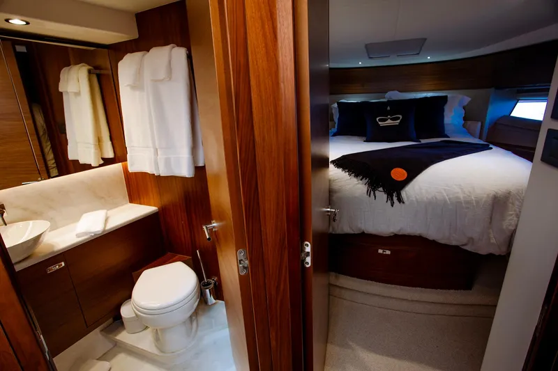 Slide: The Image of Luxurious 2022 Princess F50 yacht interior with elegant bedroom and bathroom. - 47