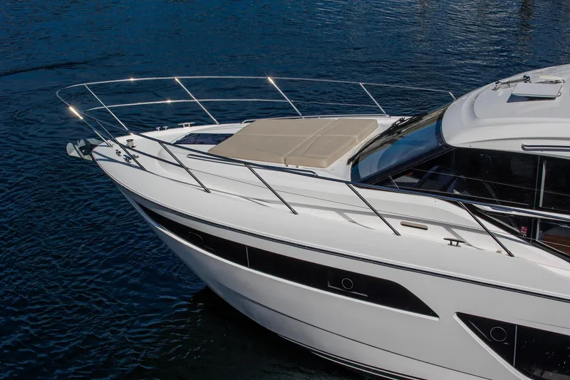 Slide: The Image of Luxury 2022 Princess F50 yacht on calm blue water. - 8