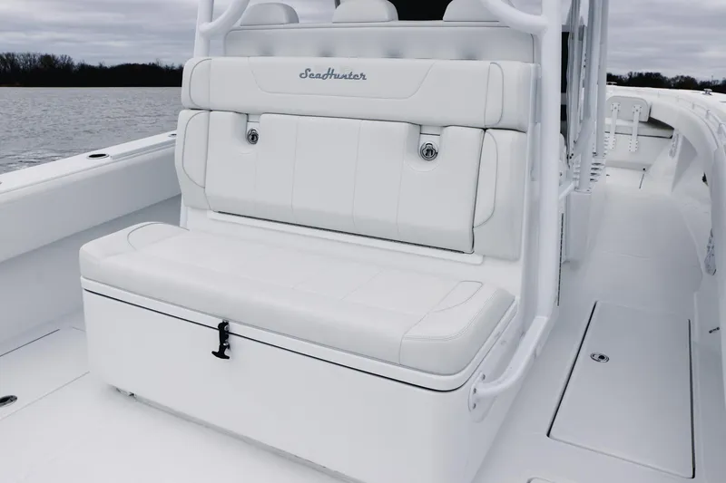 Slide: The Image of 2024 SeaHunter 35 Tournament boat with white seating, sleek design, and spacious deck. - 15