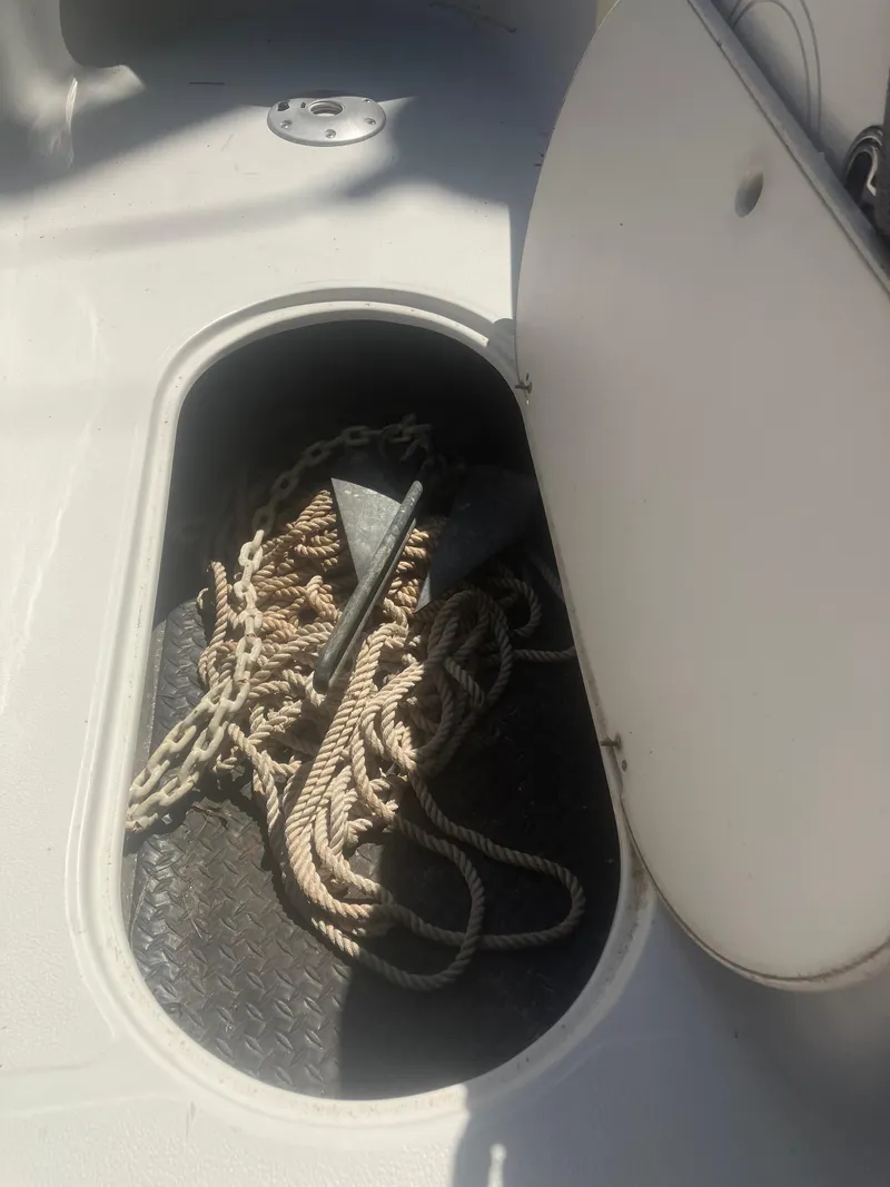 Slide: The Image of Anchor and rope storage in 2018 Starcraft Limited 2000 OB Fish boat. - 13