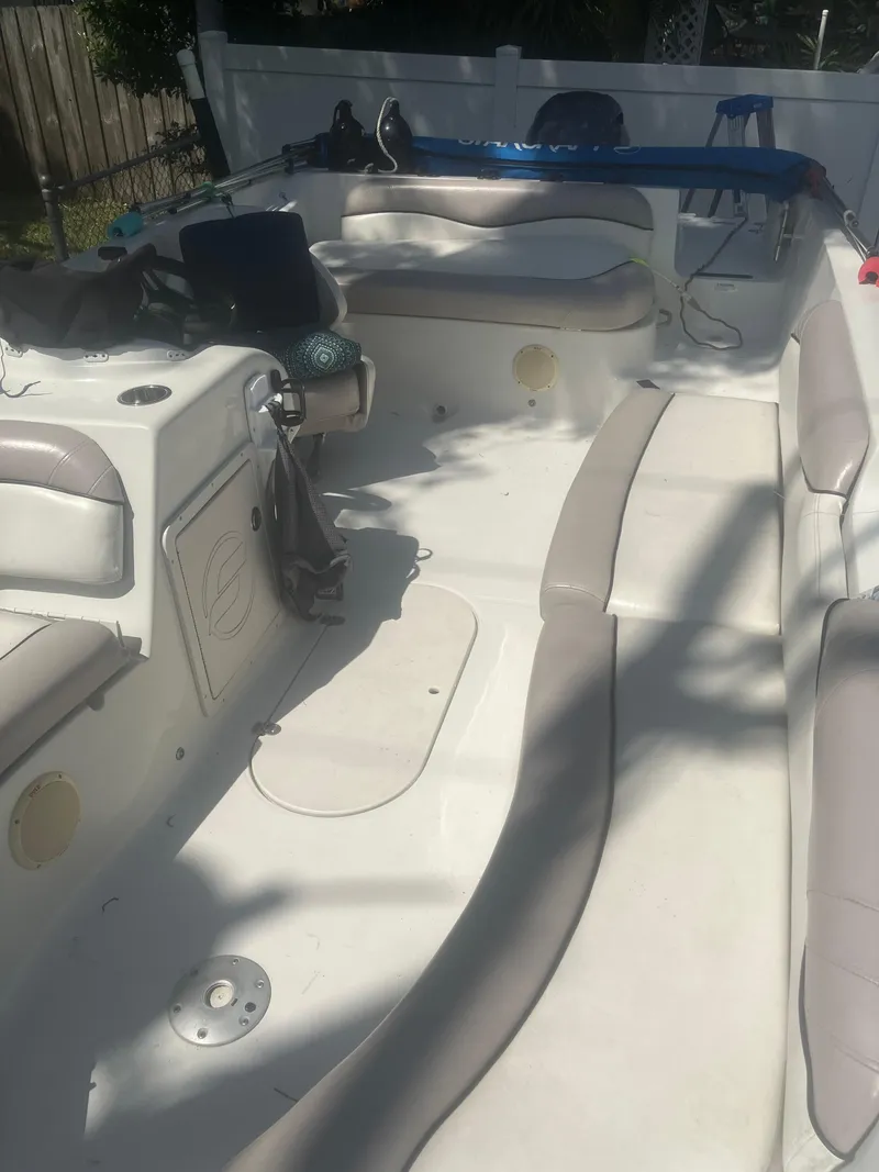 Slide: The Image of 2018 Starcraft Limited 2000 OB Fish boat interior with seating and storage. - 15