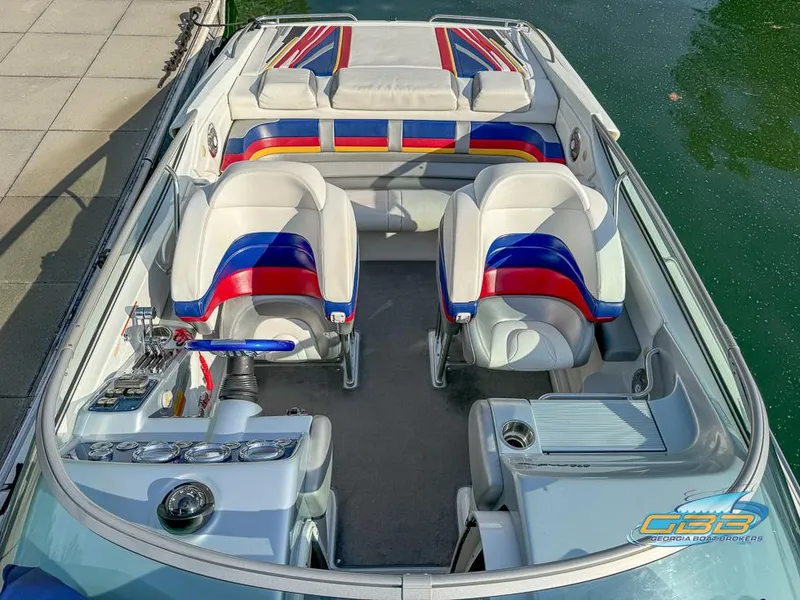 Slide: The Image of 2008 Formula 292 FASTech boat interior with colorful seating and sleek design. - 18