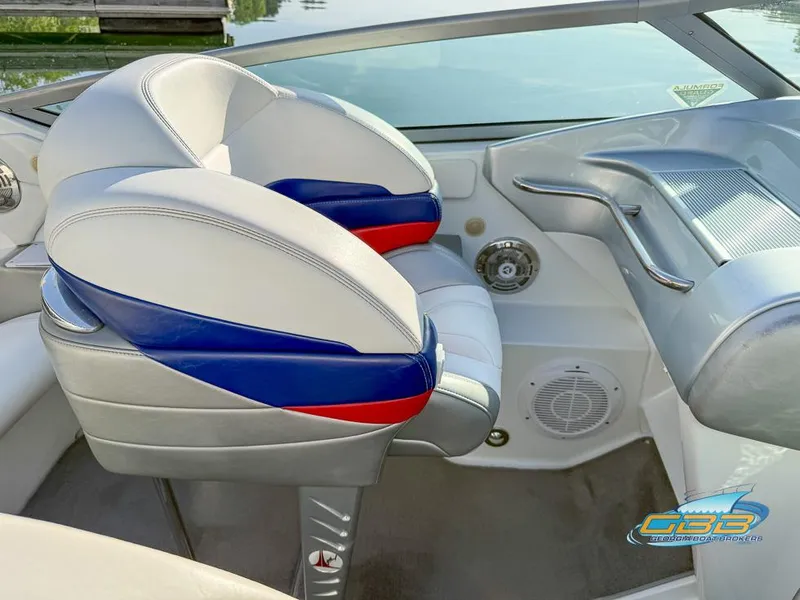 Slide: The Image of 2008 Formula 292 FASTech boat interior with white, blue, and red seating. - 19