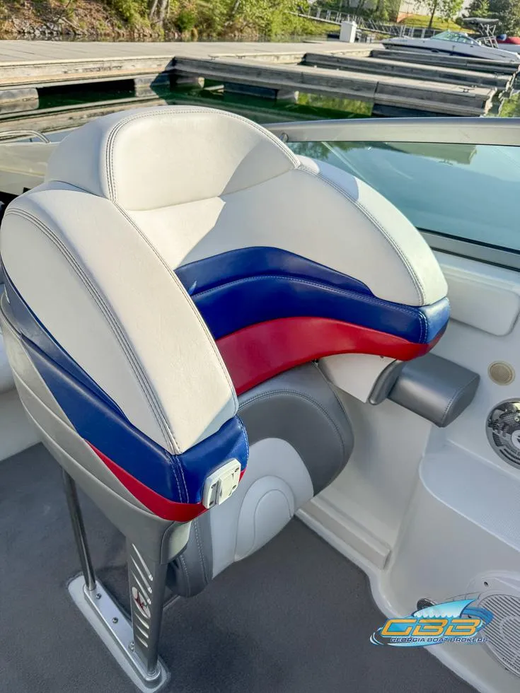 Slide: The Image of 2008 Formula 292 FASTech boat seat with red, blue, and white upholstery. - 20