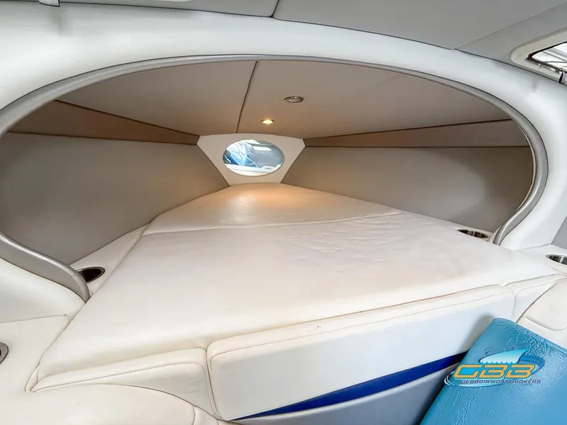 Slide: The Image of 2008 Formula 292 FASTech cabin interior with white upholstery and circular window. - 27