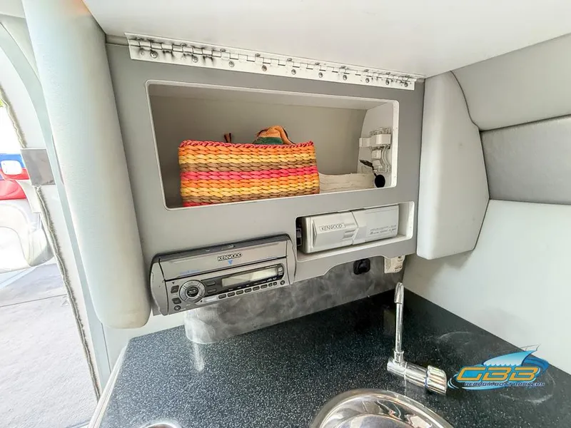 Slide: The Image of Interior of 2008 Formula 292 FASTech boat with stereo, storage, and sink. - 31