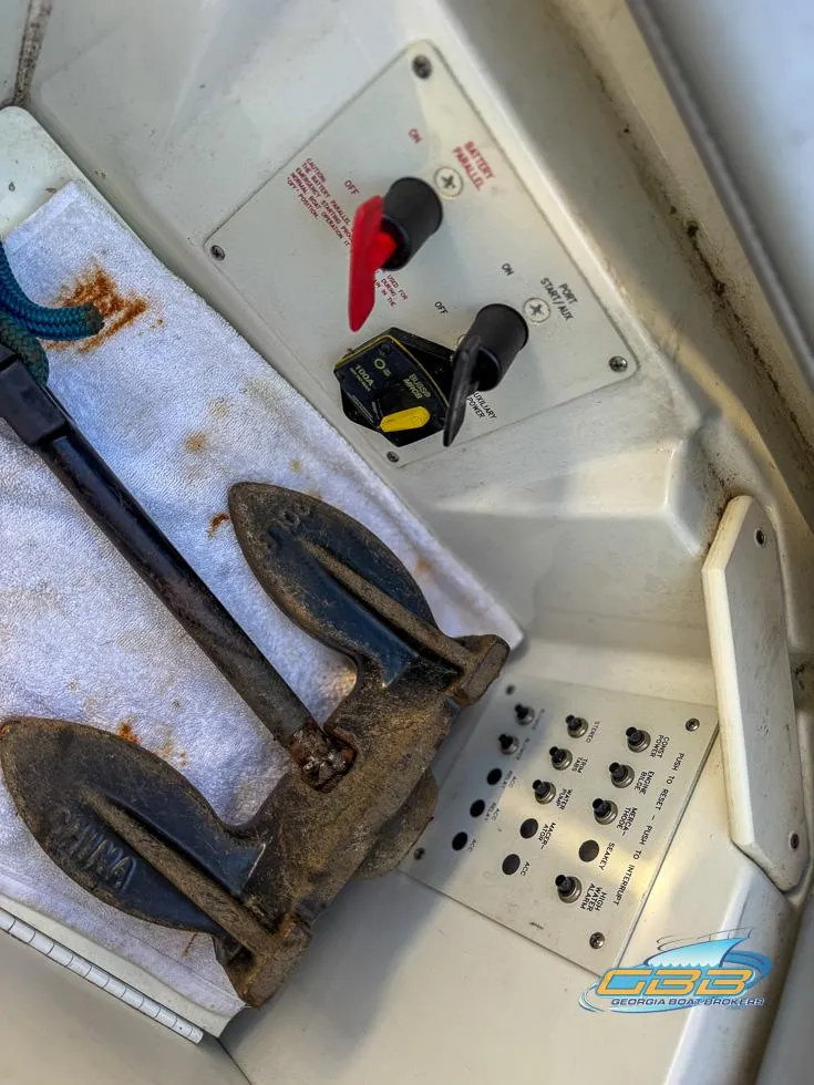 Slide: The Image of 2008 Formula 292 FASTech boat anchor and control panel with switches. - 32