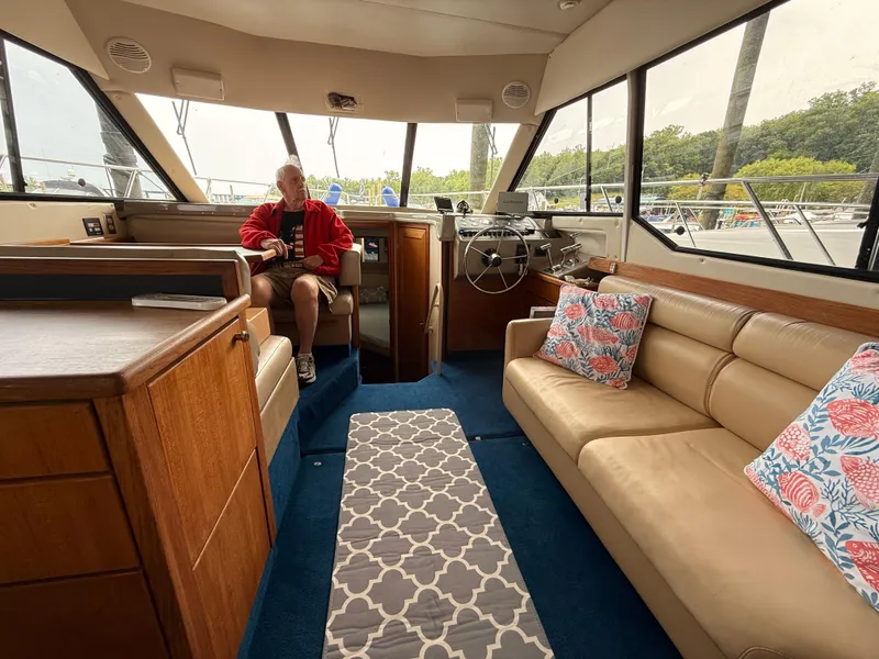 Slide: The Image of Interior of 2000 Bayliner 4087 Aft Cabin Motoryacht with seating and helm. - 14