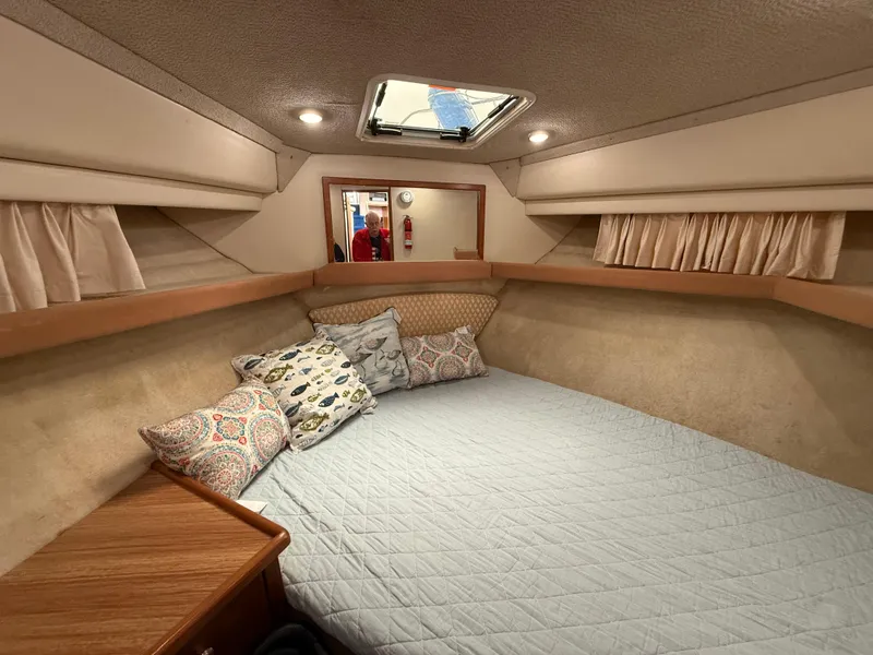 Slide: The Image of Cozy cabin interior of 2000 Bayliner 4087 Aft Cabin Motoryacht with bed and pillows. - 19