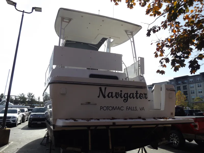 Slide: The Image of 2000 Bayliner 4087 Aft Cabin Motoryacht, docked, rear view, "Navigator" in Potomac Falls, VA. - 6