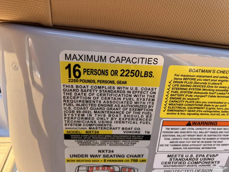 Slide: The Image of 2025 MasterCraft NXT24 capacity label: 16 persons or 2250 lbs, safety compliance details. - 21