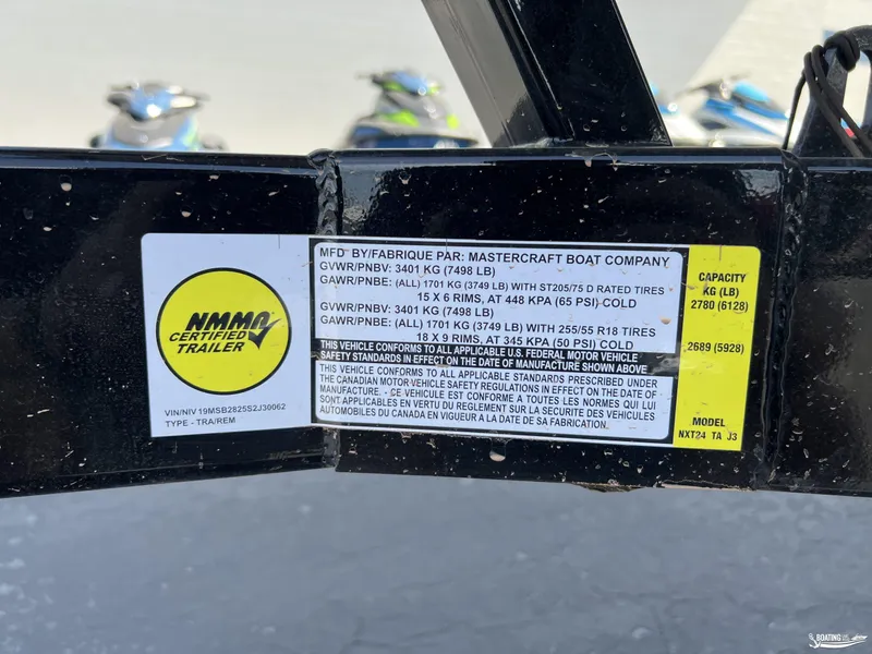 Slide: The Image of 2025 MasterCraft NXT24 trailer label with specifications and certification details. - 22