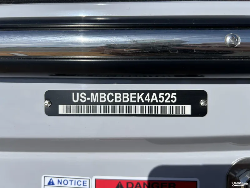 Slide: The Image of 2025 MasterCraft NXT24 boat identification plate with serial number and barcode. - 23
