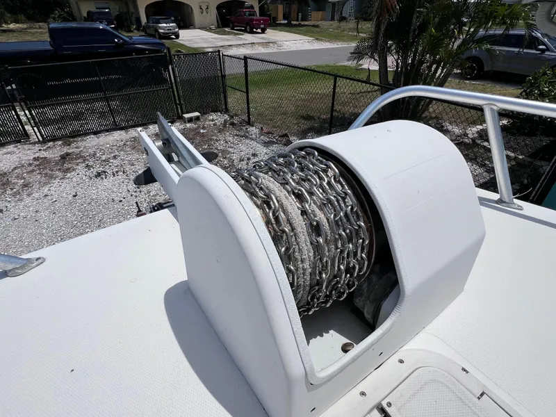 Slide: The Image of Anchor chain on a 2005 Twin Vee 22 Awesome Center Console boat deck. - 12