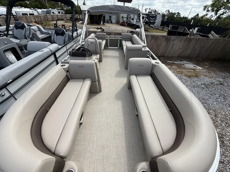 Slide: The Image of 2025 Avalon VLS 23 Quad Lounger pontoon boat with spacious seating and modern design. - 3