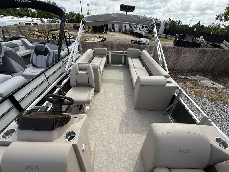 Slide: The Image of 2025 Avalon VLS 23 Quad Lounger pontoon boat with spacious seating and modern design. - 4