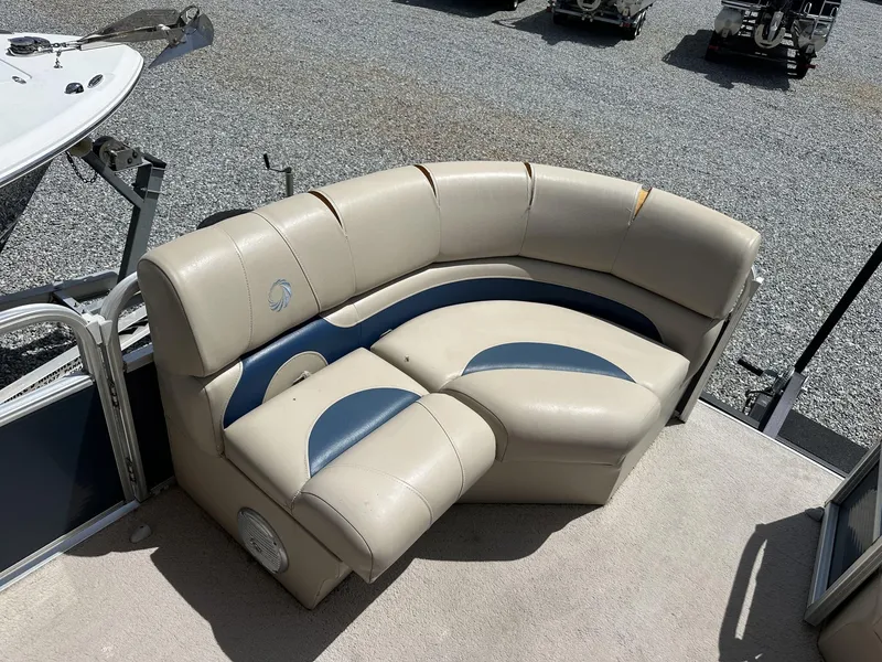 Slide: The Image of 2015 Lowe SS190 boat with beige and blue cushioned seating. - 6