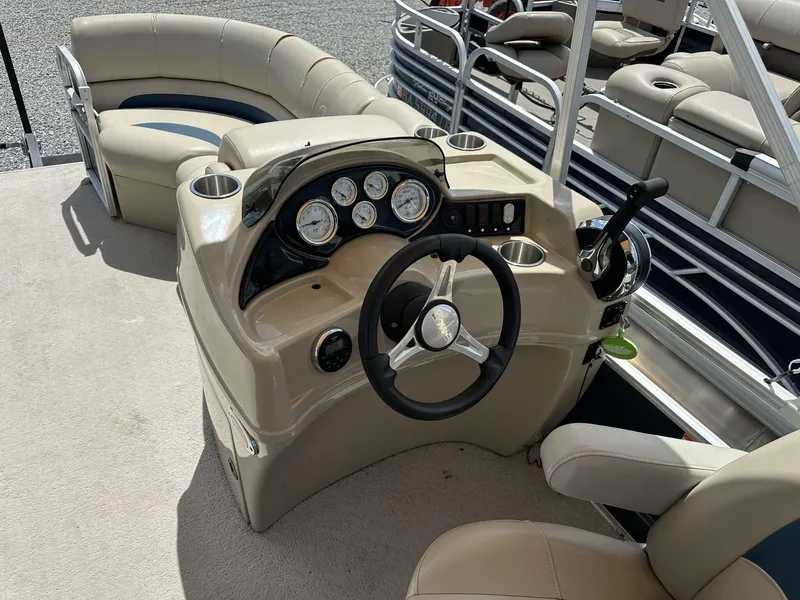 Slide: The Image of 2015 Lowe SS190 boat interior with steering console and seating area. - 8