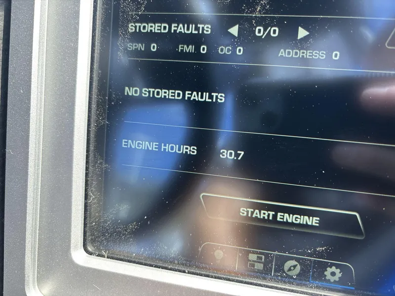 Slide: The Image of Display screen of 2022 Supra SE 450 showing engine hours and no stored faults. - 15