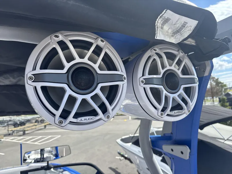 Slide: The Image of 2022 Supra SE 450 boat with JL Audio speakers mounted on the tower. - 16