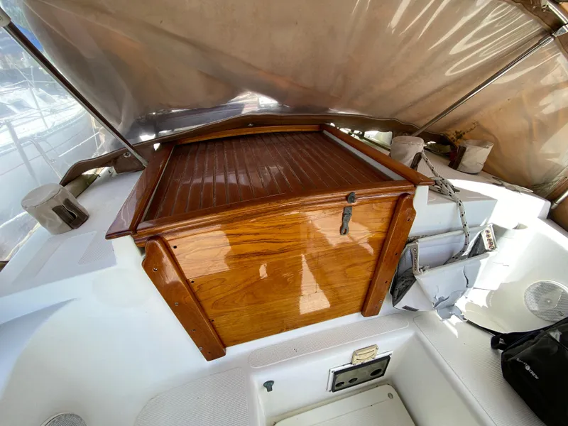Slide: The Image of 1986 Pacific Seacraft Crealock 37 cockpit with wooden hatch and protective canopy. - 23