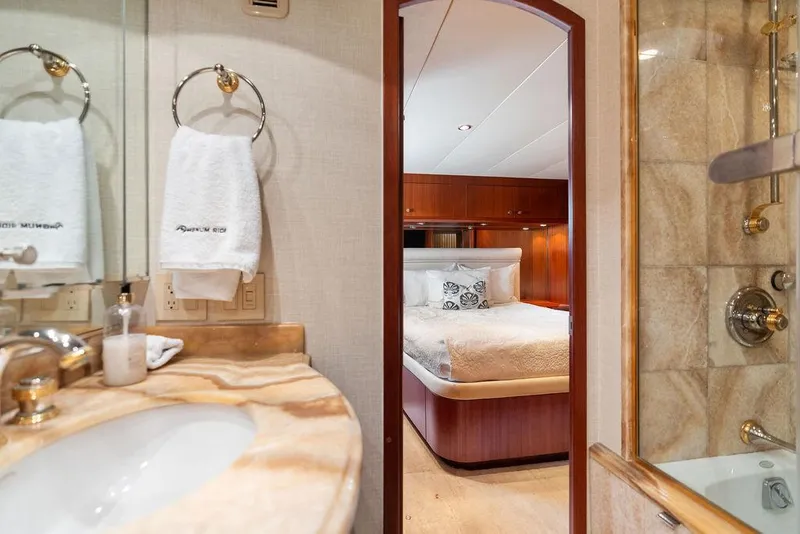 Slide: The Image of Luxurious bathroom and bedroom interior of 2004 Hatteras 100 Motor Yacht. - 42