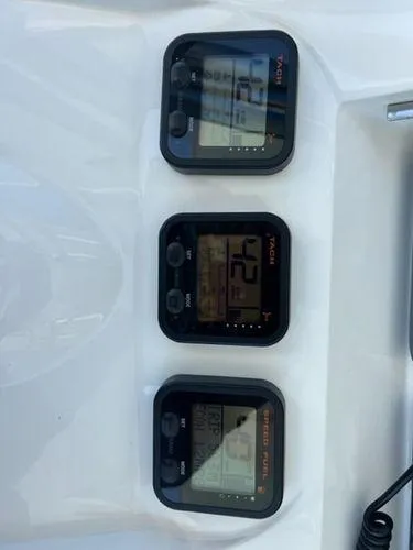 Slide: The Image of Boat instrument panel with three digital displays, Spectre 34, 2008 model. - 20