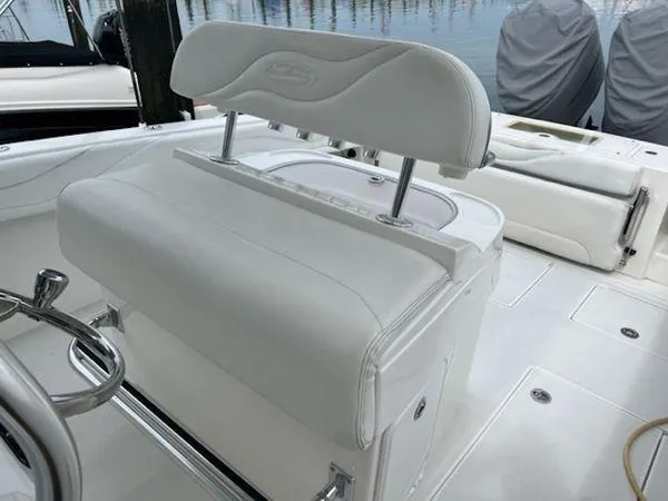 Slide: The Image of White seating area on a 2008 Spectre 34 boat, featuring sleek design and comfortable upholstery. - 38