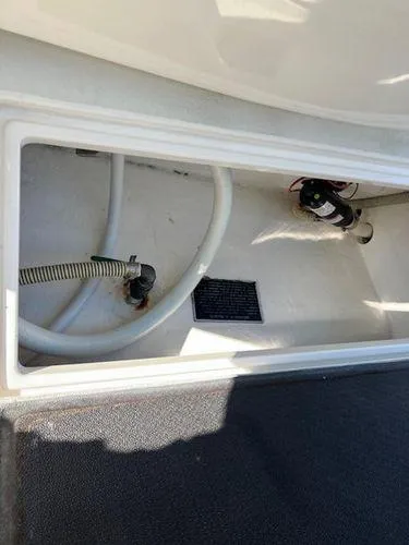 Slide: The Image of Boat compartment with hoses and pump, Spectre 34, 2008 model. - 41