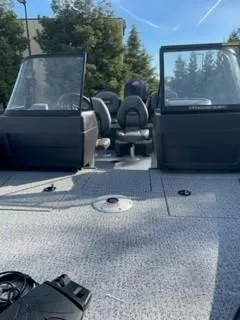 Slide: The Image of 2025 Tracker Pro Guide V-175 WT boat with open cockpit and seating. - 6