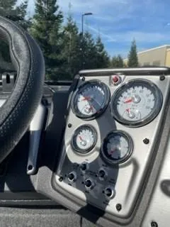 Slide: The Image of Dashboard of 2025 Tracker Pro Guide V-175 WT boat with gauges and controls. - 9