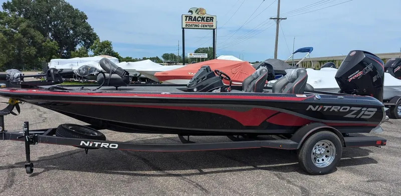 Slide: The Image of 2024 Nitro Z19 boat on trailer at Tracker Boating Center. - 0