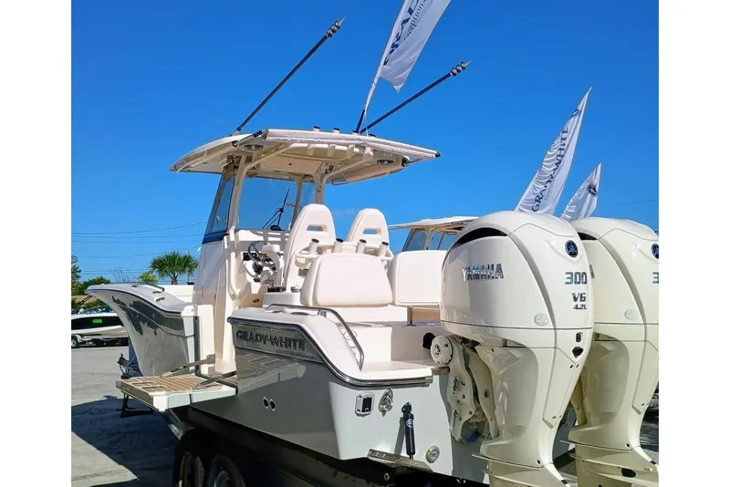 Slide: The Image of 2025 Grady-White 281 Coastal Explorer boat with dual Yamaha 300 V6 engines. - 5