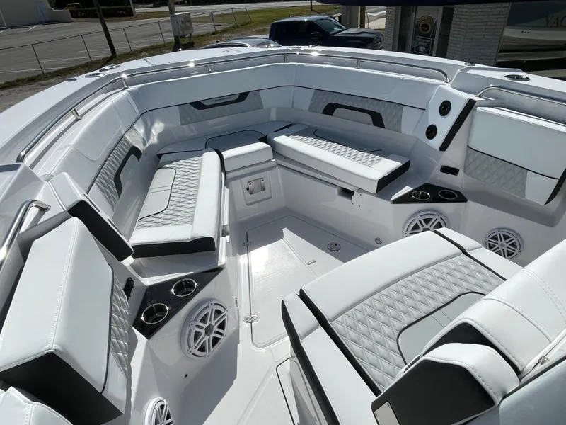 Slide: The Image of Luxurious interior of 2025 Blackfin 302CC boat with plush seating and modern design. - 23