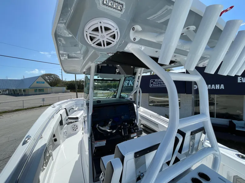 Slide: The Image of 2025 Blackfin 302CC boat interior with modern console and seating, showcasing advanced marine design. - 41