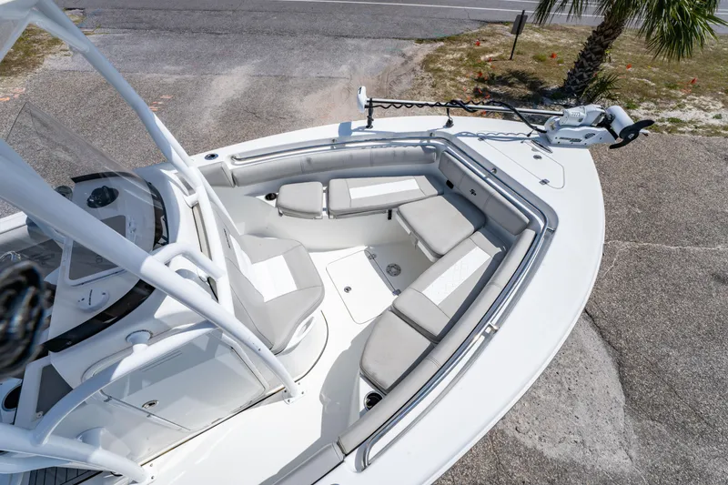 Slide: The Image of 2019 Sea Pro 219 DLX boat with spacious seating and modern design. - 24