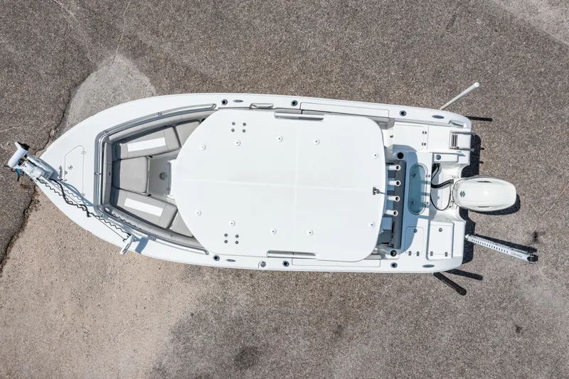 Slide: The Image of Top view of a 2019 Sea Pro 219 DLX boat on a textured surface. - 28