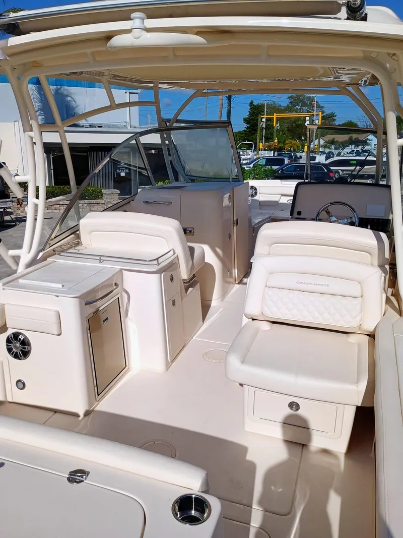 Slide: The Image of 2025 Grady-White Freedom 285 boat interior with seating and helm station. - 15
