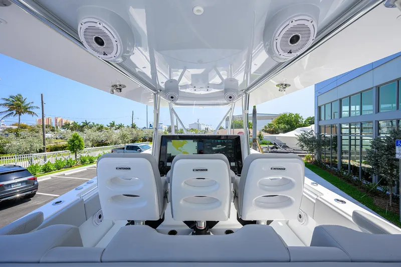 Slide: The Image of 2025 Contender 44ST boat interior with modern seating and navigation system. - 19