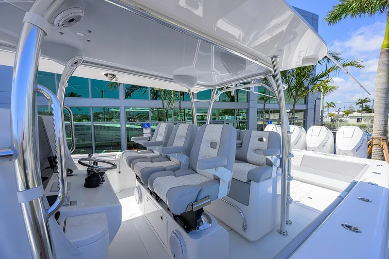 Slide: The Image of 2025 Contender 44ST boat interior with modern seating and sleek design. - 22