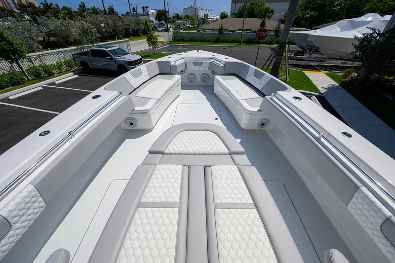 Slide: The Image of 2025 Contender 44ST boat interior with luxurious seating and modern design. - 5